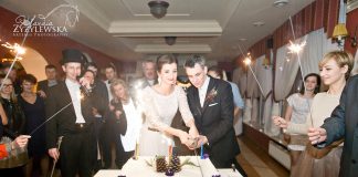 Krasnodwór w rytmie radości: wesele z wodzirejem Karpikiem Państwo Młodzi przy krojeniu tortu weselnego szablą wodzireja Karpika